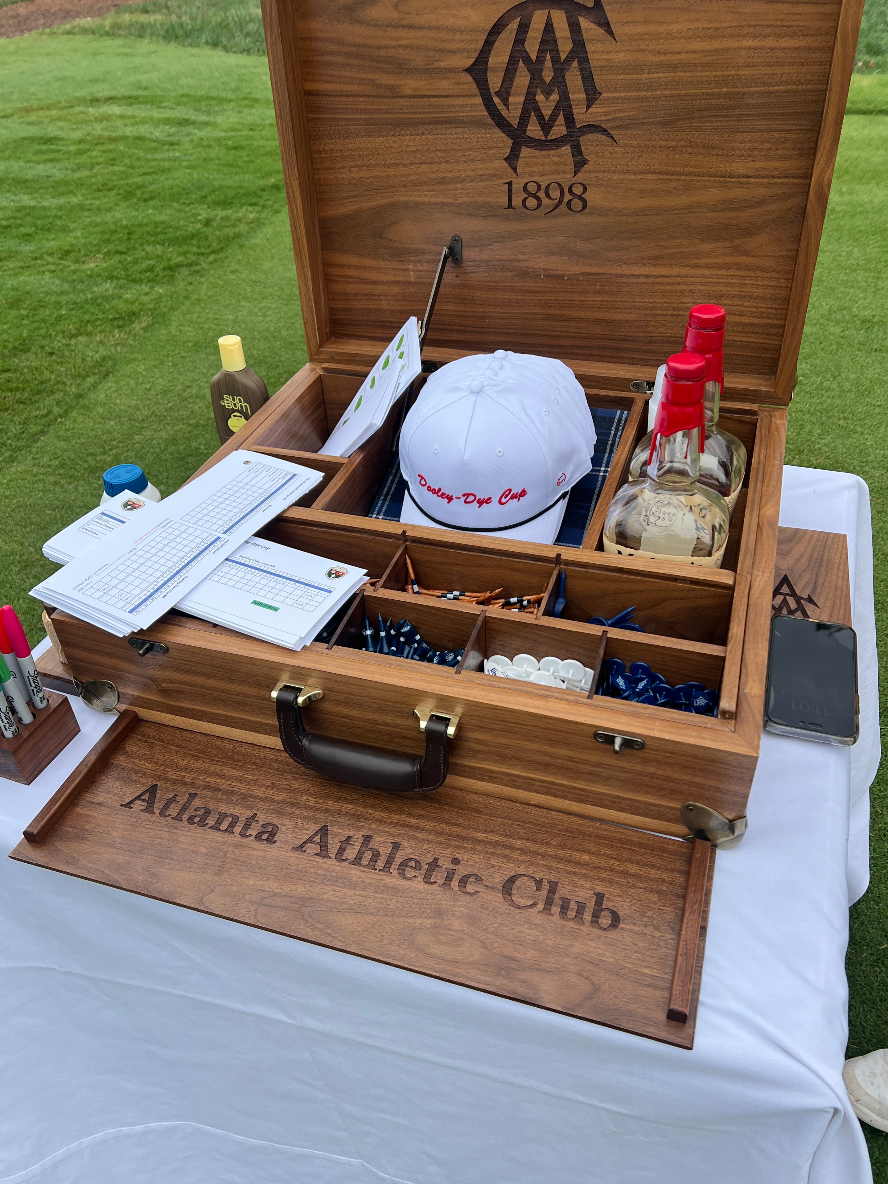 Atlanta Athletic Club caddie box with Dooley-Dye Cup gear