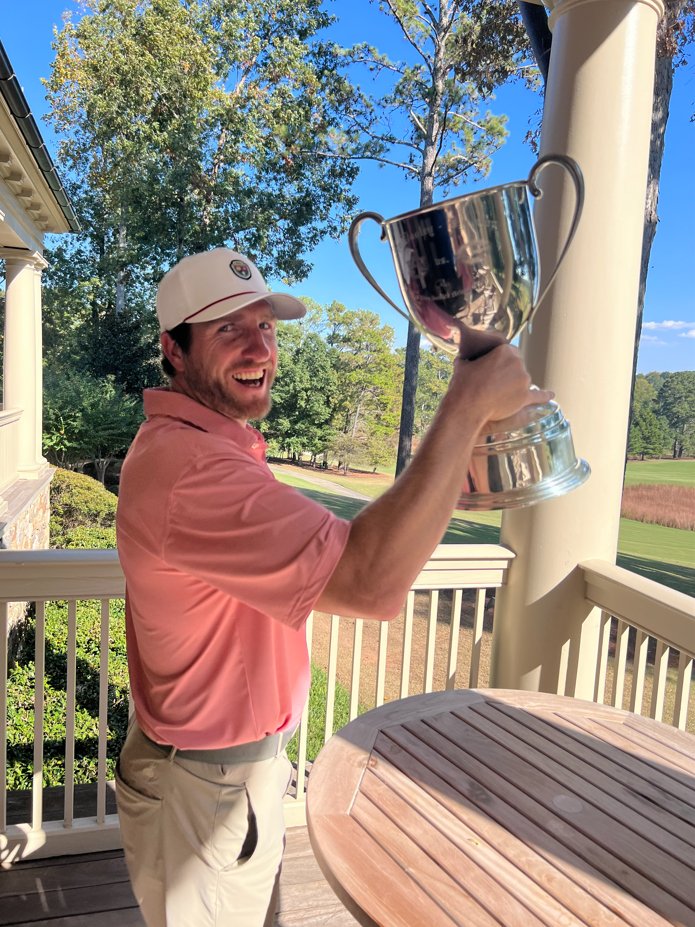 The Dooley-Dye Cup trophy overlooking the course