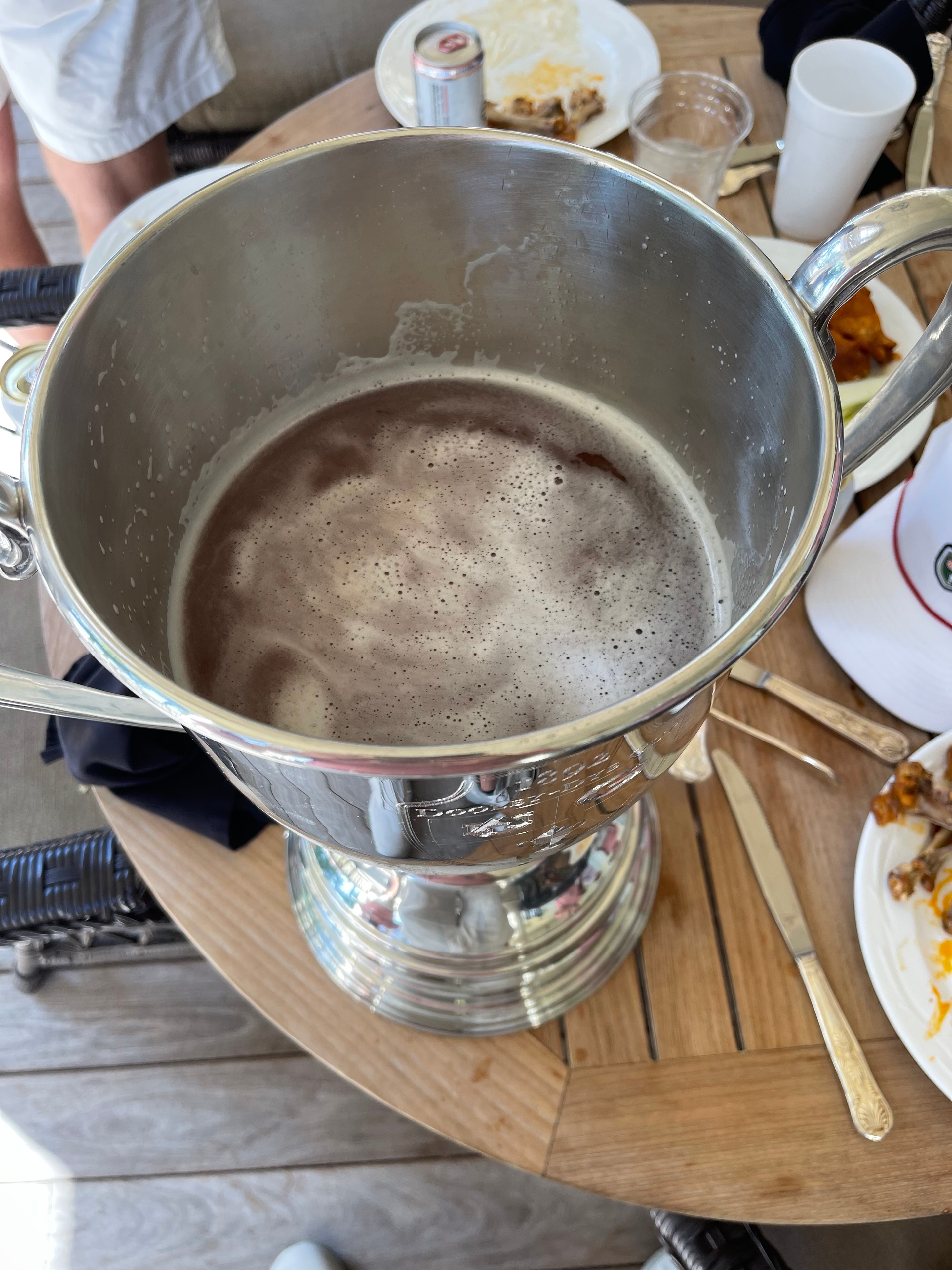 Dooley-Dye Cup trophy on a table at the post-round celebration